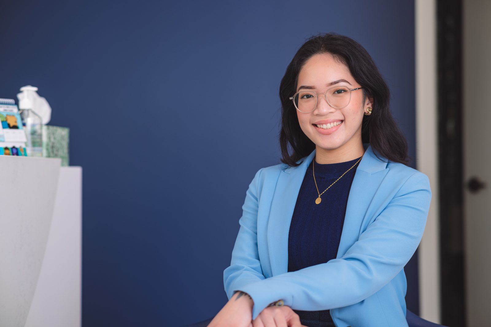 Estella Panganiban, receptionist at the front desk of iSmile Dental in Langley, BC