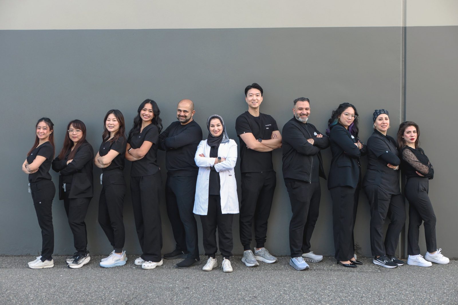 Full iSmile Dental team photo in Langley, BC: dentists, hygienists, dental assistants, managers and reception